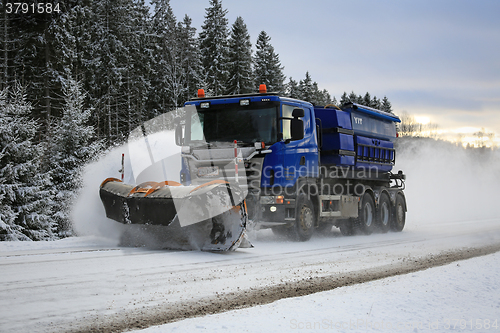 Image of Scania Truck Equipped with Snowplow Clears Highway