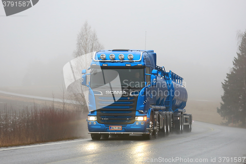 Image of Blue Scania R580 Tank Truck on Foggy Road