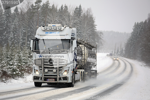 Image of Mercedes-Benz Actros Tank Truck Pushes Forward in Winter Weather