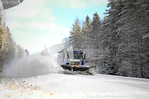 Image of Snowplow Clears Scenic Road