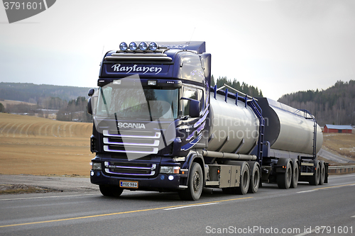 Image of Purple Scania R500 Tank Truck on Rural Road