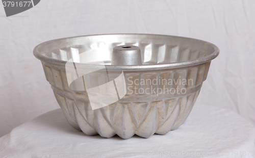 Image of Old fluted tube baking pan isolated