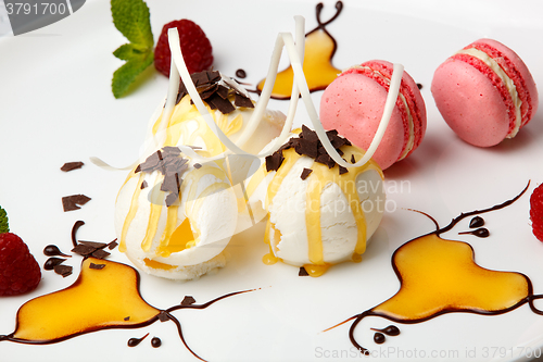 Image of Pink macaroons with vanilla ice cream and honey