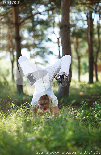 Image of Asana pose in the forest