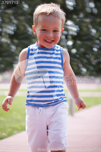 Image of Portrait of smiling happy boy