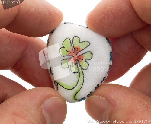 Image of Stone with drawing of a clover four and small hearts