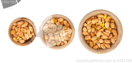 Image of Fresh mixed salted nuts in a bowl, peanut mix