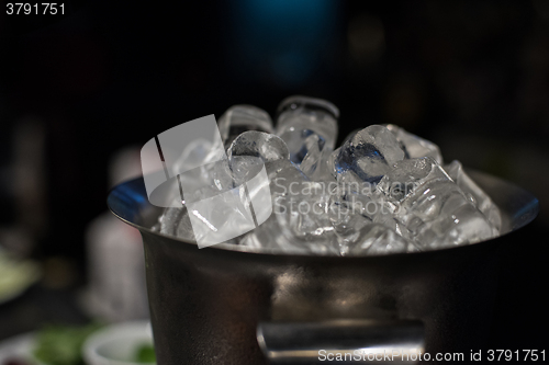 Image of Ice bucket with ice cubes