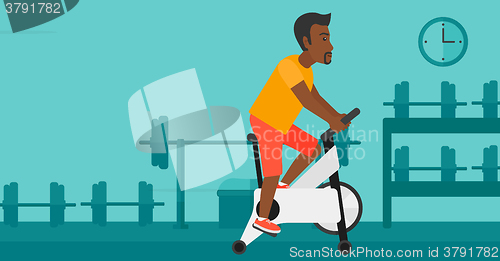 Image of Man doing cycling exercise.