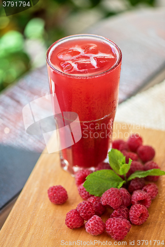 Image of fruit drink with raspberries