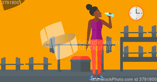 Image of Woman drinking water.