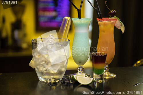 Image of cocktails on bar background