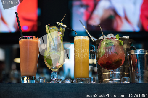 Image of cocktails on bar background