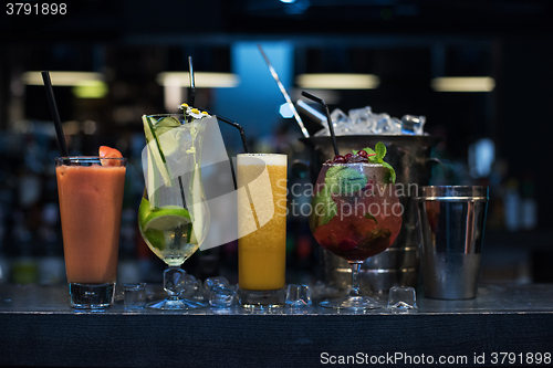 Image of cocktails on bar background