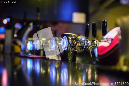 Image of Metallic beer taps