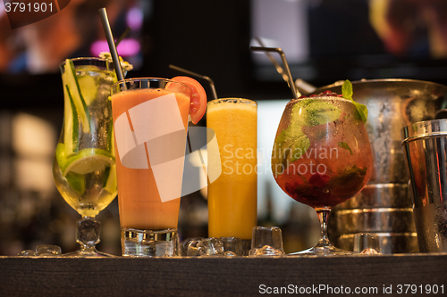 Image of cocktails on bar background