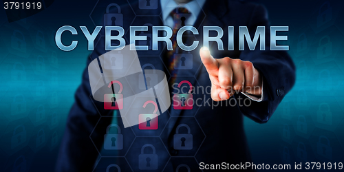 Image of Crime Investigator Pushing CYBERCRIME\r