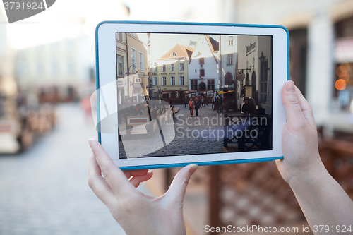 Image of Making photo or video with pad of old street in Tallinn, Estonia