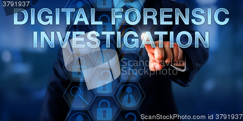 Image of Examiner Pressing DIGITAL FORENSIC INVESTIGATION