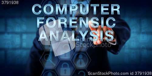 Image of Examiner Touching COMPUTER FORENSIC ANALYSIS