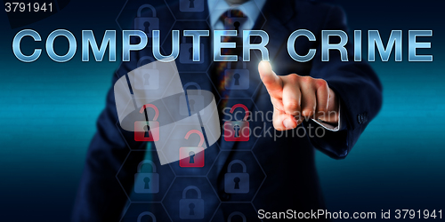 Image of Forensic Investigator Pushing COMPUTER CRIME\r