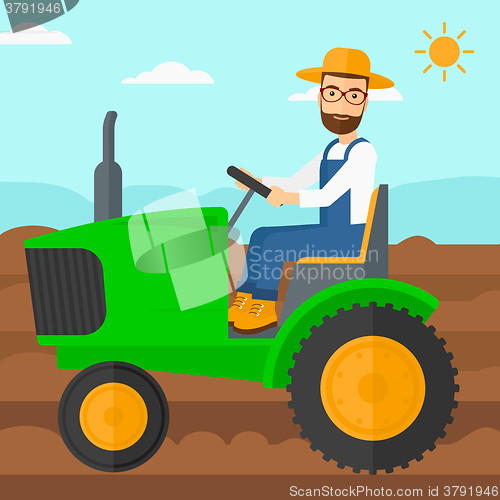 Image of Farmer driving tractor.