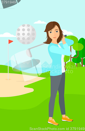 Image of Golf player hitting the ball.