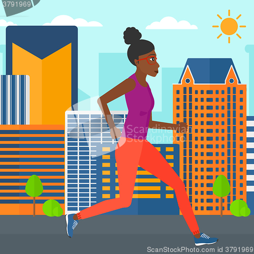 Image of Sportive woman jogging.