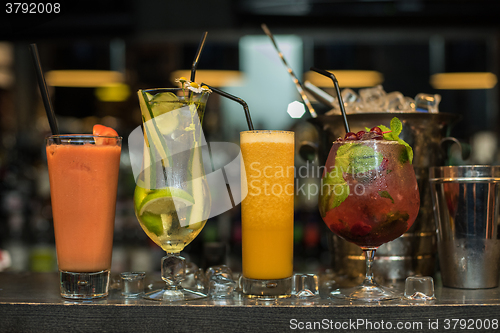 Image of cocktails on bar background