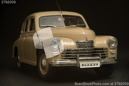 Image of  retro car on a black background