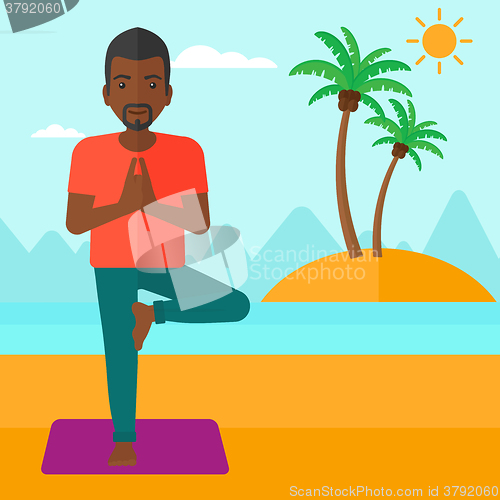 Image of Man practicing yoga.