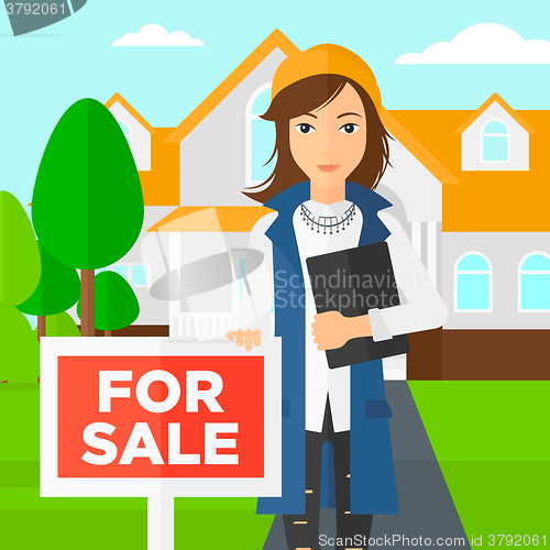 Image of Real estate agent offering house.