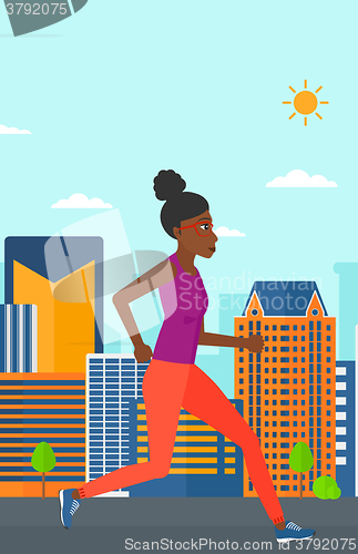 Image of Sportive woman jogging.