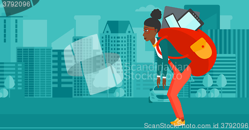 Image of Woman with backpack full of devices.