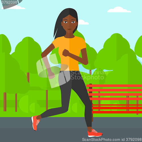Image of Sportive woman jogging.