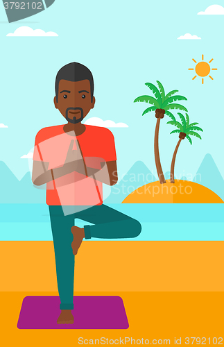 Image of Man practicing yoga.