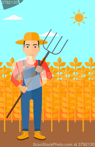 Image of Farmer with pitchfork.