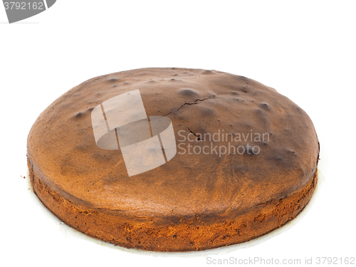 Image of Whole circular shaped chocolate cake towards white