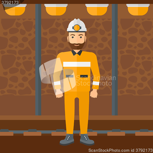 Image of Confident miner in hardhat.