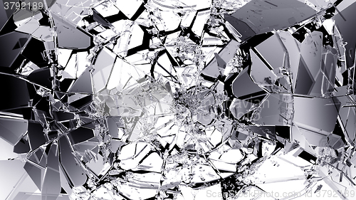 Image of Broken and cracked glass isolated on black