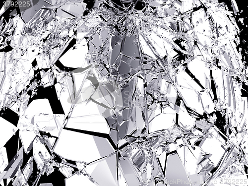 Image of Pieces of Broken Shattered black glass isolated on black