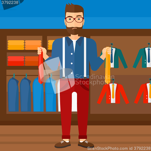 Image of Customer choosing neckties.