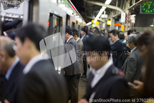 Image of Passengers traveling by Tokyo metro.