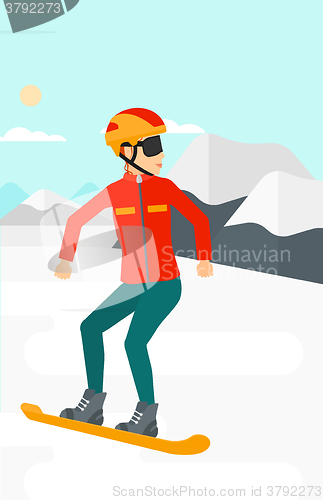 Image of Young woman snowboarding.