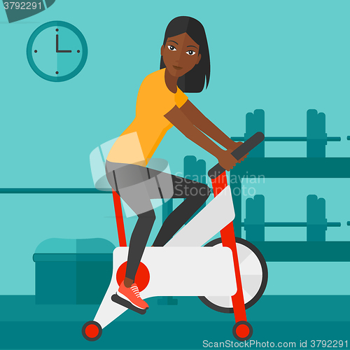 Image of Woman doing cycling exercise.