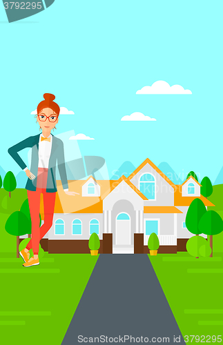 Image of Real estate agent offering house.