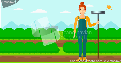 Image of Farmer with rake.