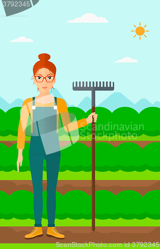 Image of Farmer with rake.