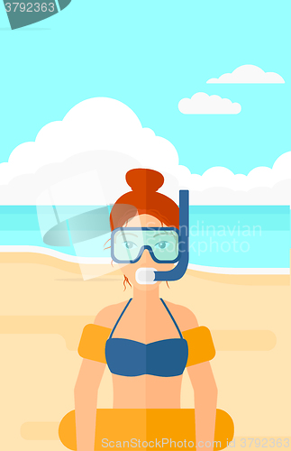 Image of Woman with swimming equipment.