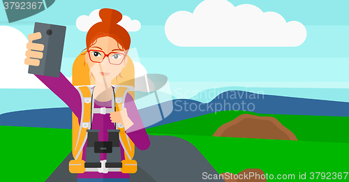 Image of Backpckaer making selfie.